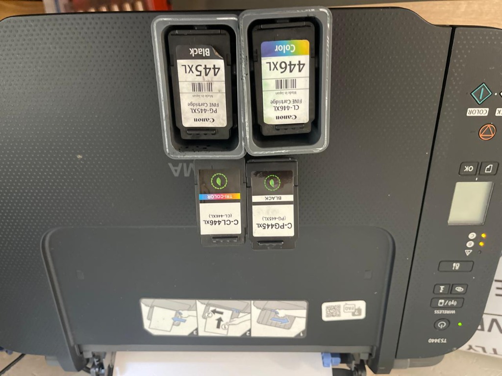 Canon PG-445XL and CL-446XL ink cartridges removed for inspection